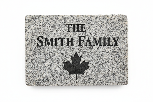 Medium granite paving stone 12x12 inches horizontal with donor name and maple leaf