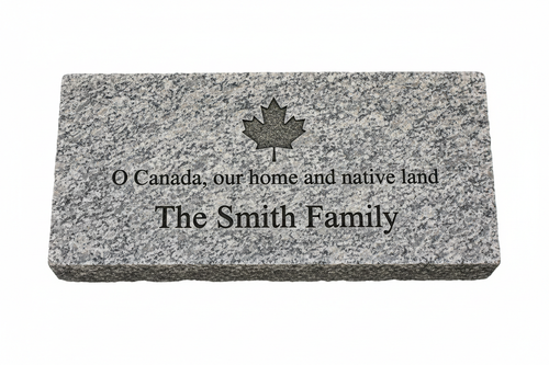 Large granite paving stone 12x24 inches horizontal with O Canada dedication and donor name